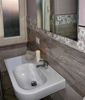 Cairoli Exclusive Rooms&suite Couette-café